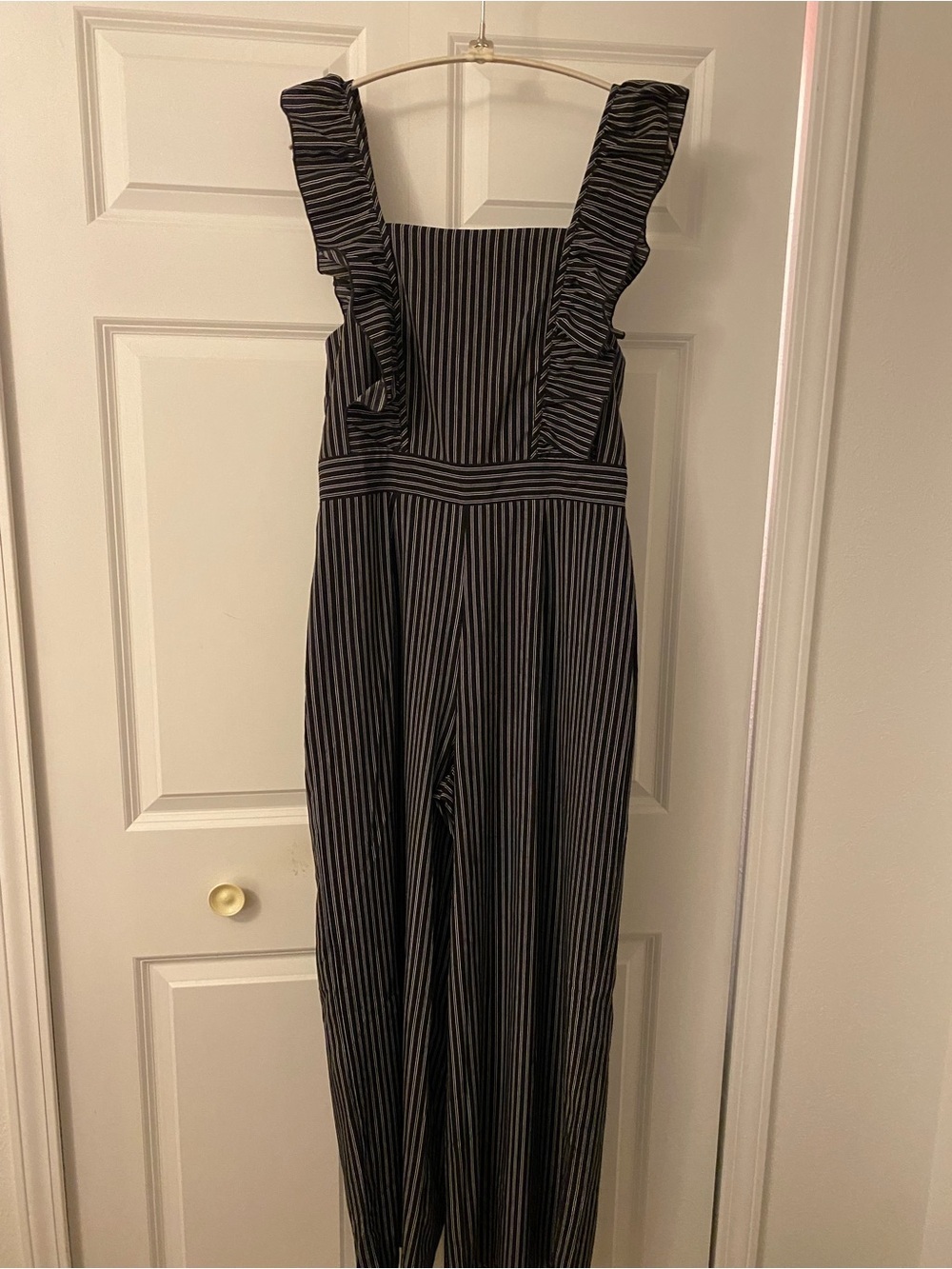 Bobou Boutique Striped Ruffle Strap Jumpsuit in Black and White. Lg.